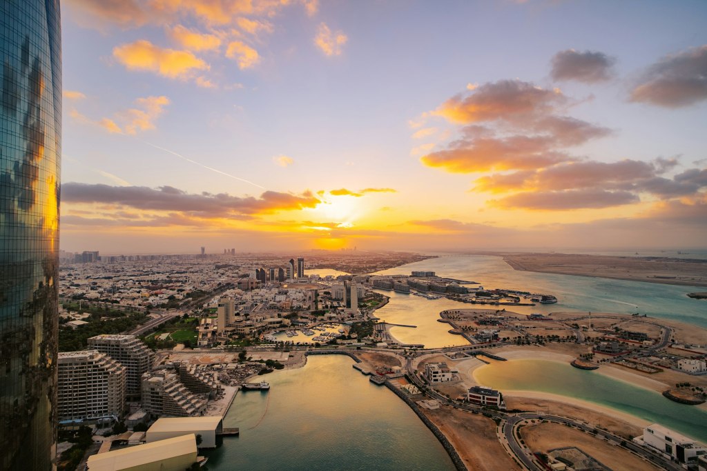 Sunset over the Abu Dhabi waterfront and city skyline
