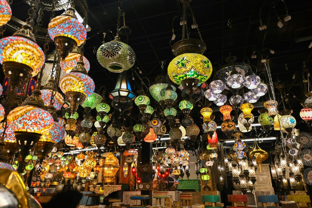 Colorful hanging lamps lighting a traditional souq in Bahrain
