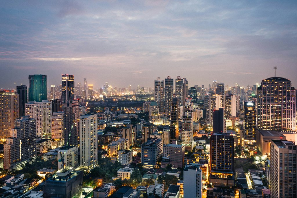 Bangkok skyline glowing at twilight, home to the city's finest restaurants