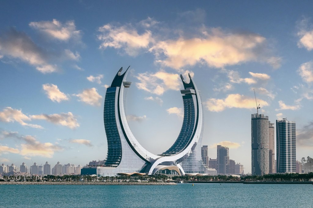 The crescent-shaped Katara Towers on the Lusail waterfront near Doha, Qatar