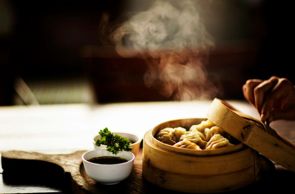 Steamed dim sum in a bamboo basket, a classic of Cantonese fine dining in Hong Kong