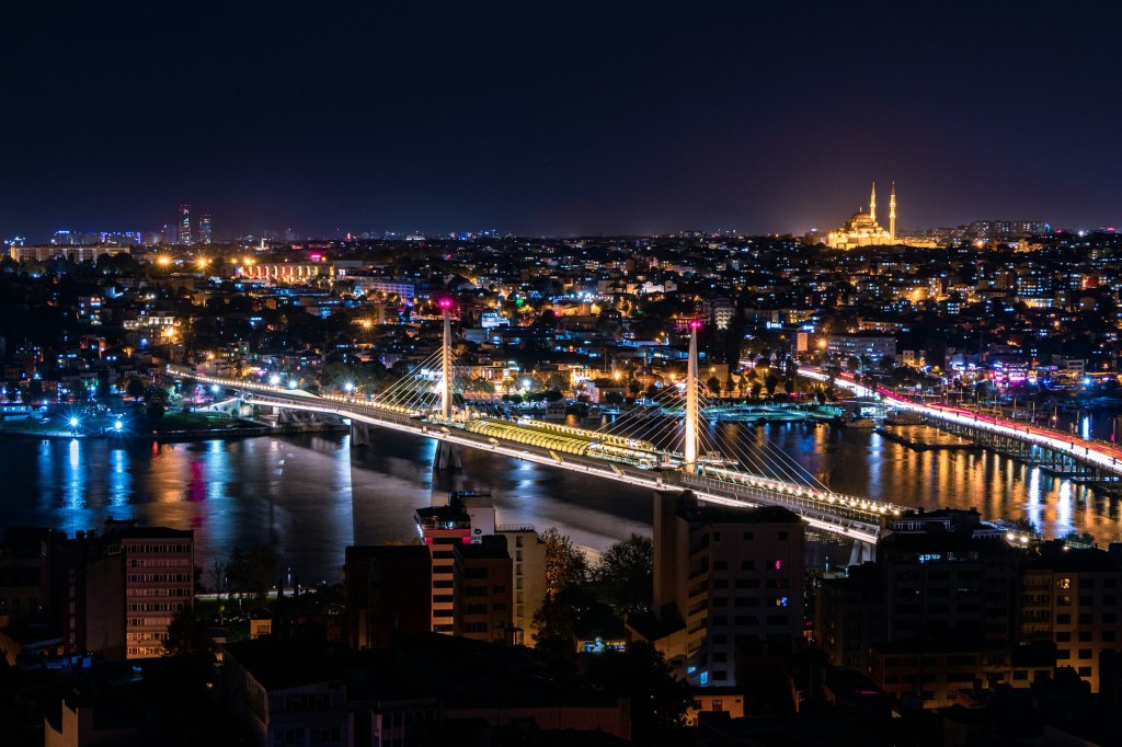 Istanbul skyline lit at night, home to the city's art museums