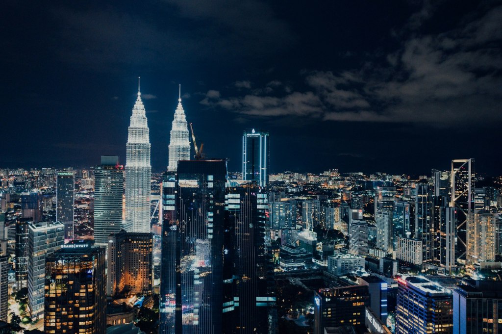 Kuala Lumpur city skyline illuminated at night