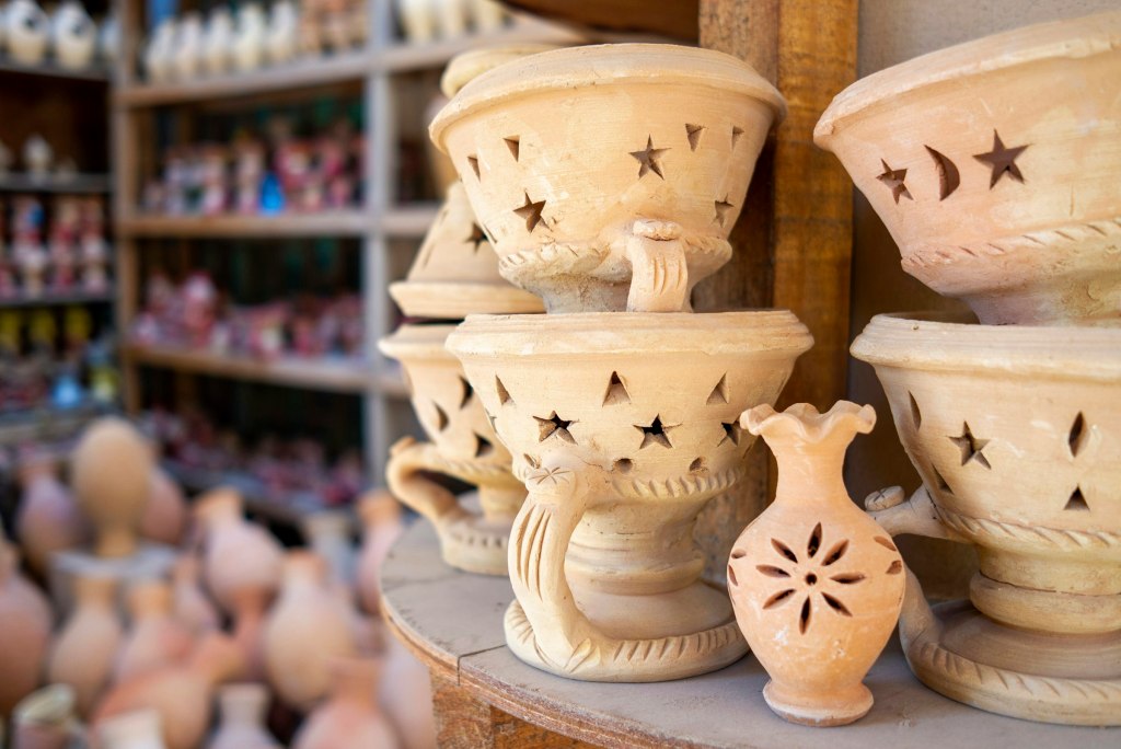 Clay pots on a table, the kind used for burning frankincense in Oman