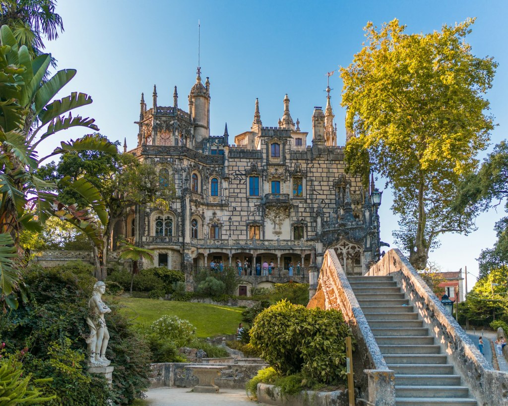 Historic palace among green trees in Sintra, Portugal