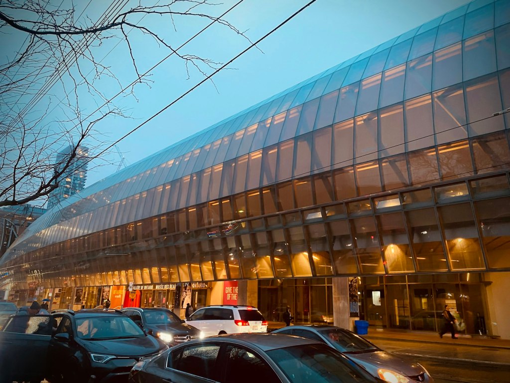 The glass and timber facade of the Art Gallery of Ontario on Dundas Street in Toronto